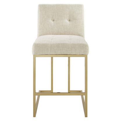Beige upholstered counter stools with tufted backs, gold metal frames, modern counter-height seating, set of 2.