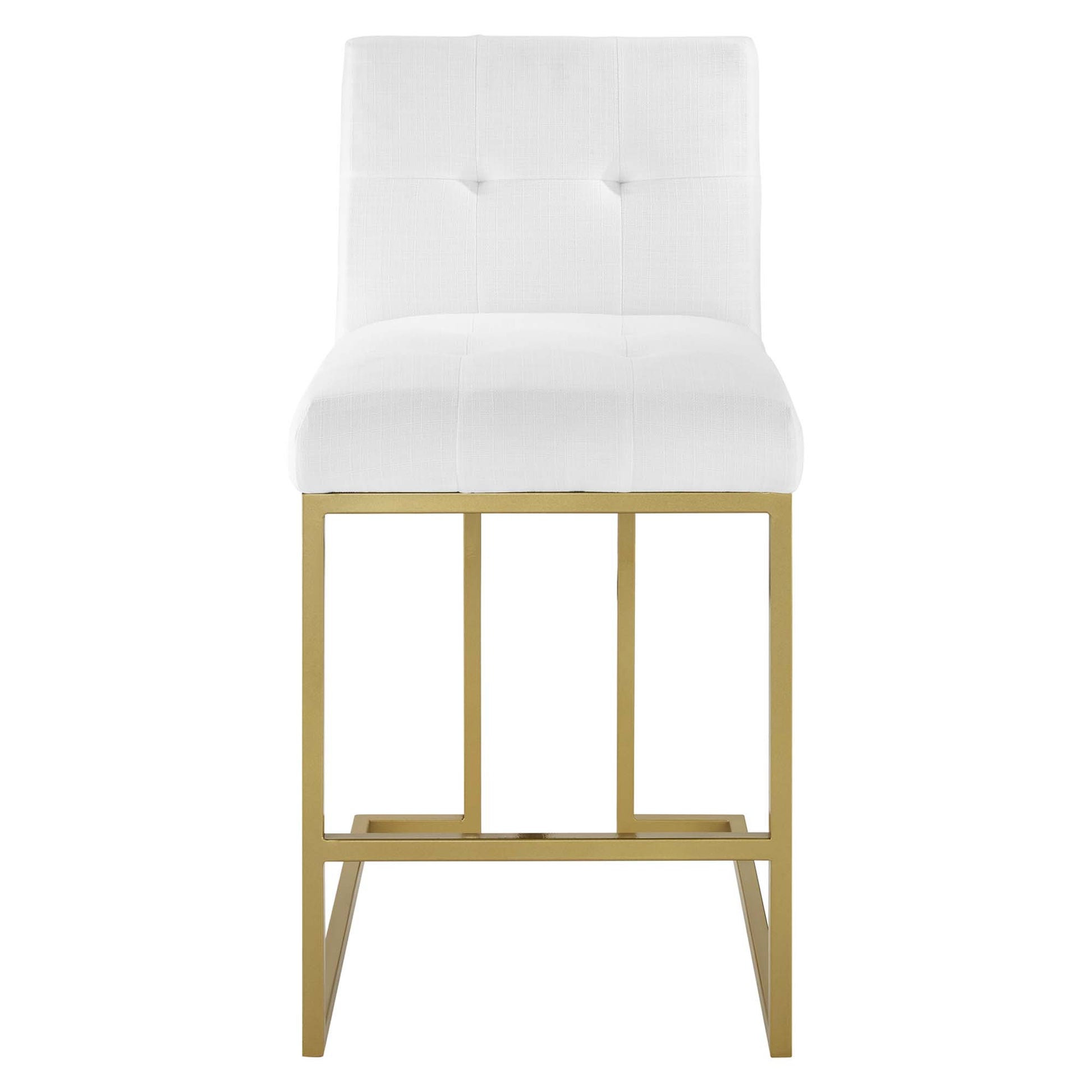 Gold-finish metal counter stool with white tufted upholstered seat and back, modern square-frame legs.