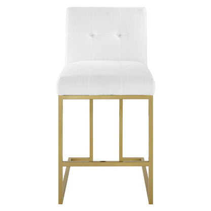 Gold-finish metal counter stool with white tufted upholstered seat and back, modern square-frame legs.
