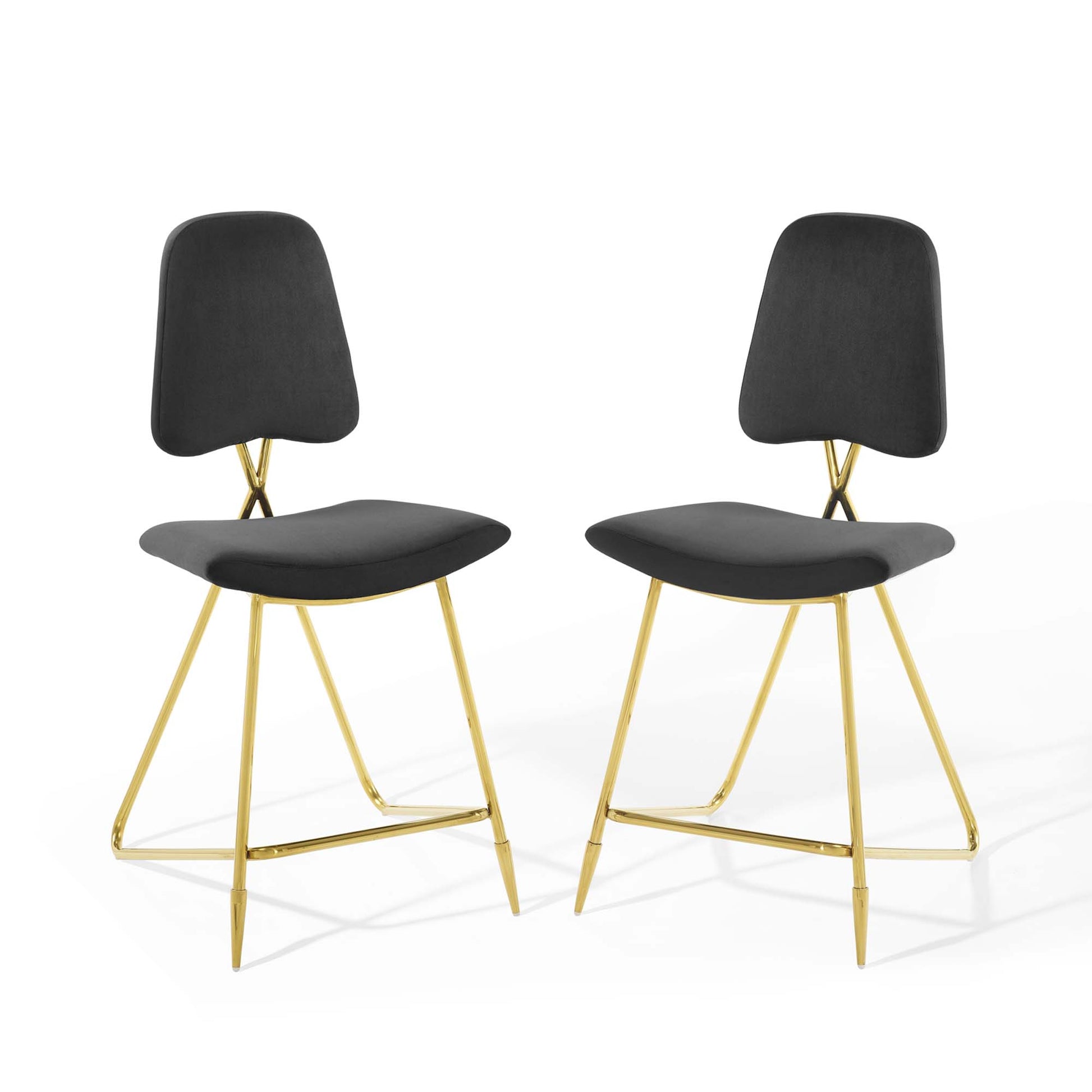 Pair of black velvet counter stools with gold metal legs and crisscross back supports.