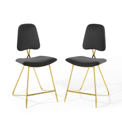 Pair of black velvet counter stools with gold metal legs and crisscross back supports.