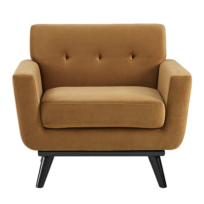 Tan performance velvet-upholstered armchair with tufted back and cushioned seat on black angled legs.