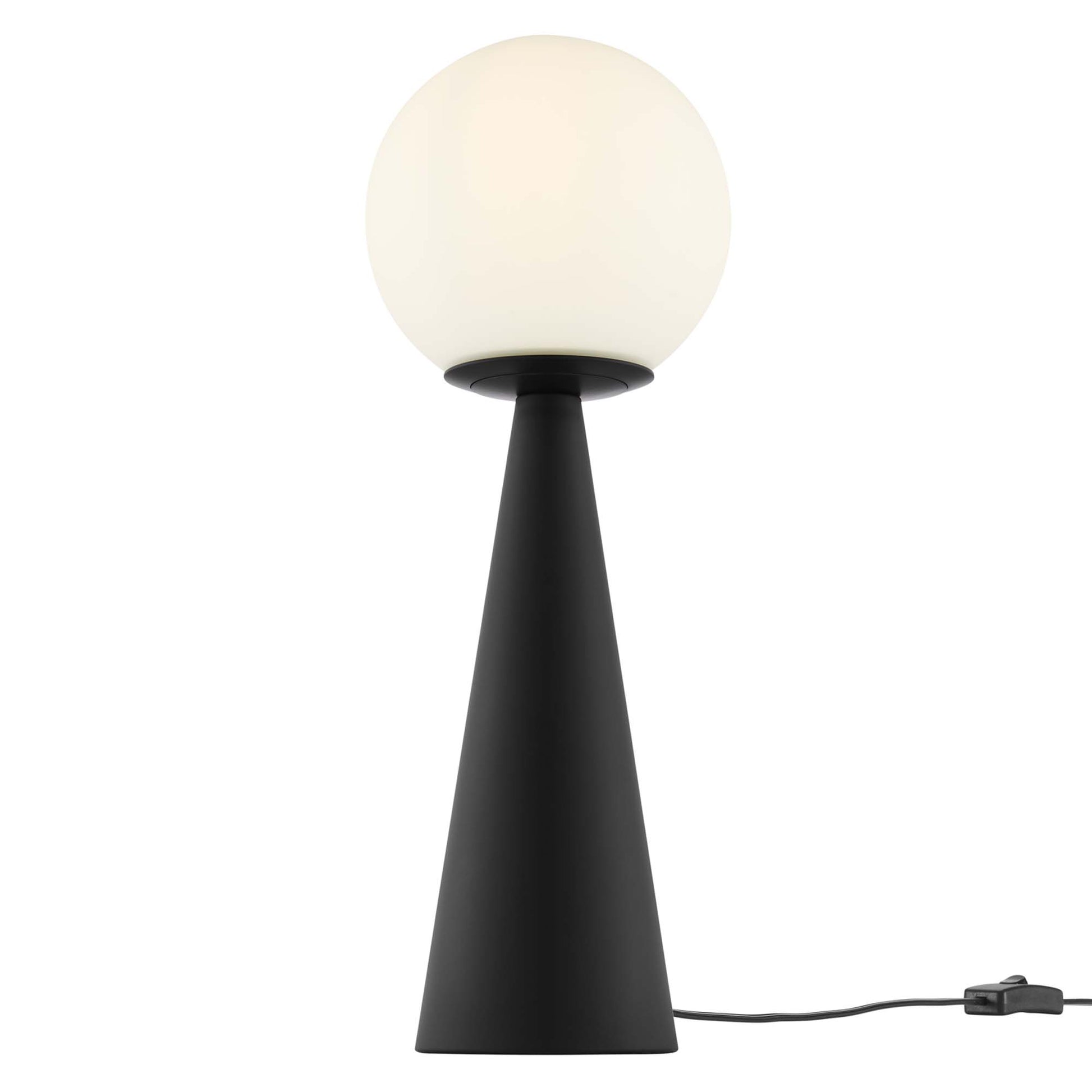 Black table lamp with a frosted white glass globe shade and an inline switch.