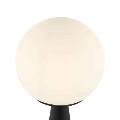 White glass globe table lamp on a black pedestal base, modern minimalist lighting.