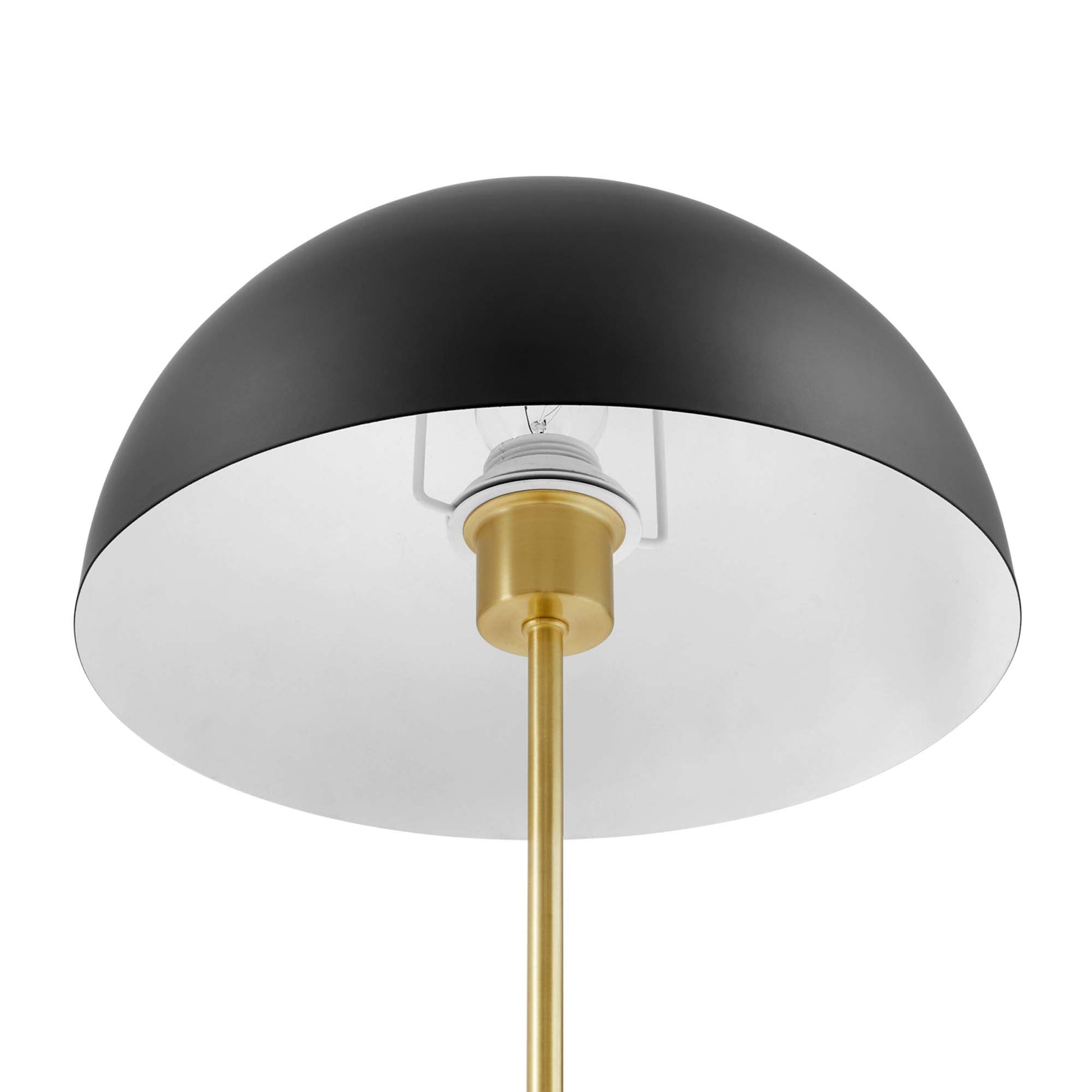 Black dome metal table lamp with brass stem and white interior, mid-century modern style.
