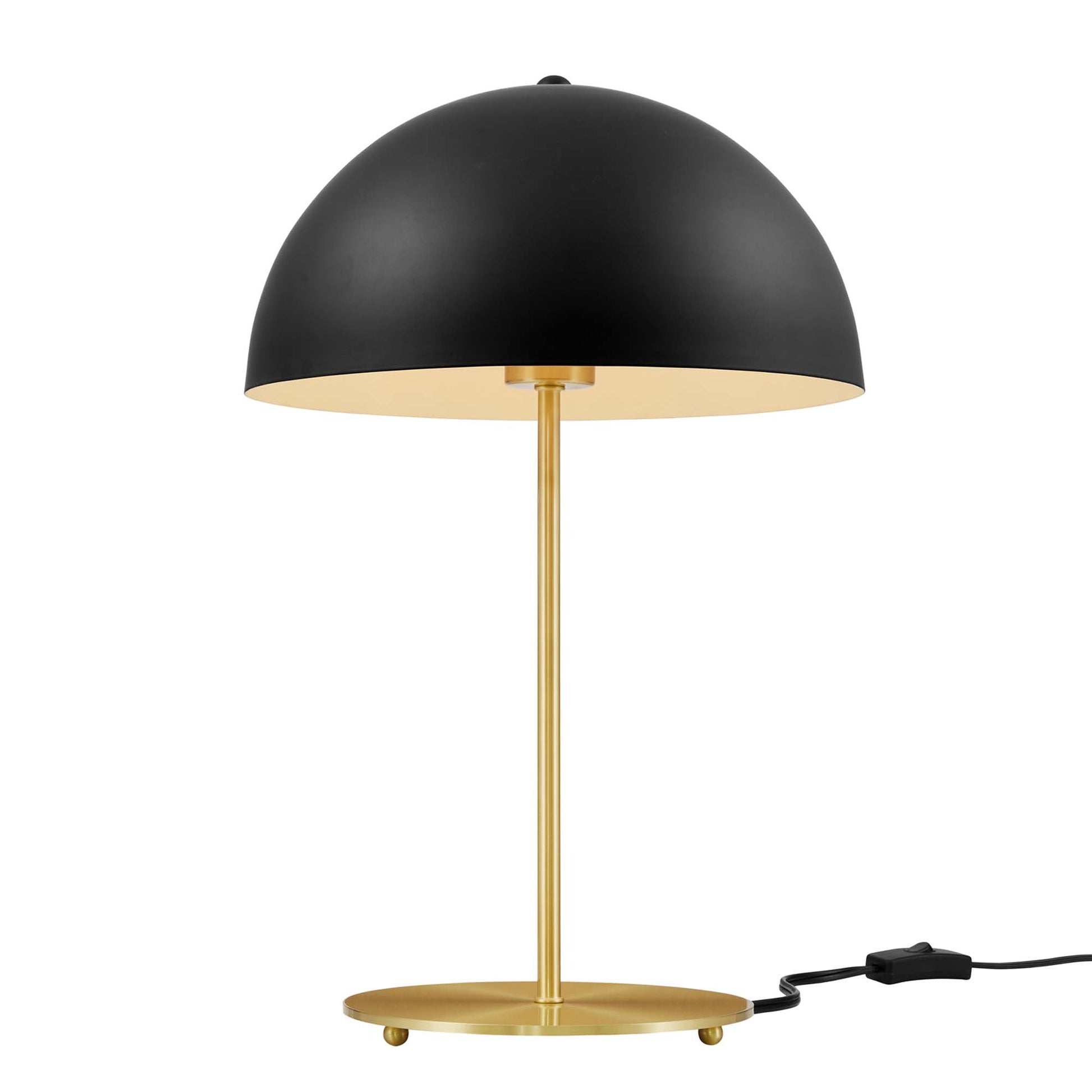 Brass table lamp with black dome shade, round base, and inline switch; mid-century style.