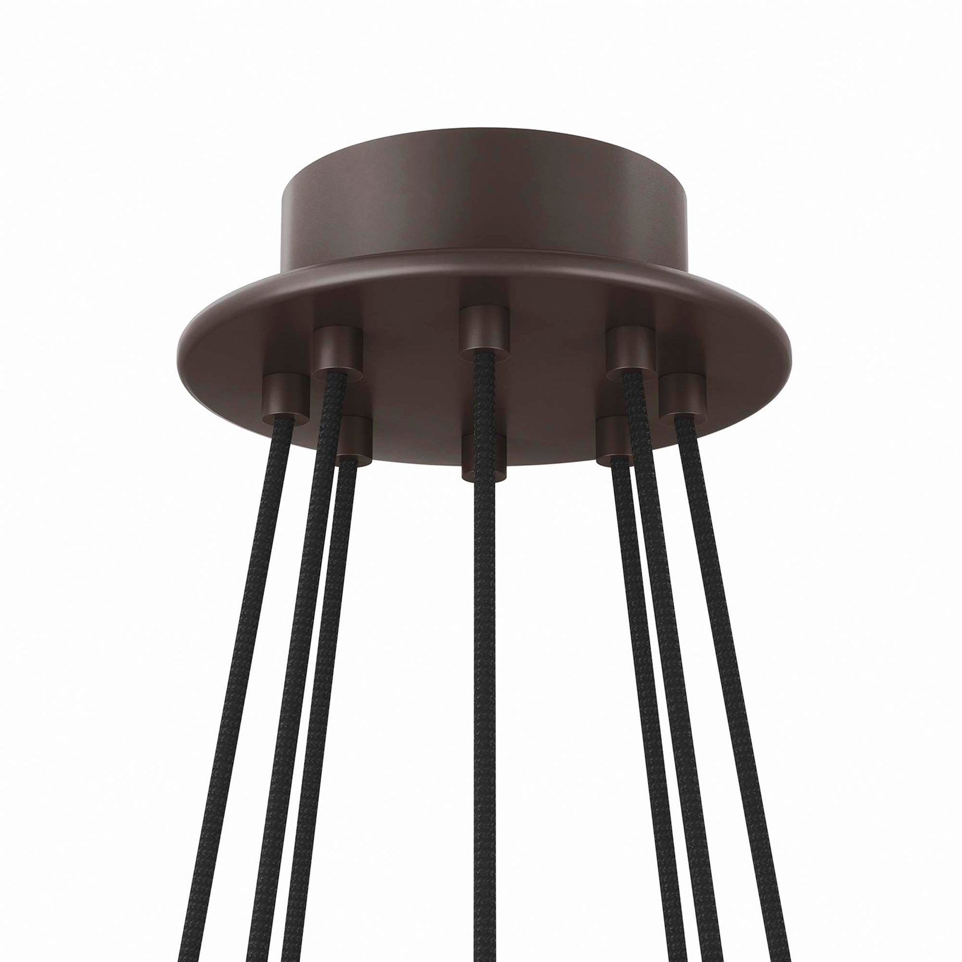White bronze round canopy with eight black fabric-wrapped cords; industrial-style eight-light chandelier.