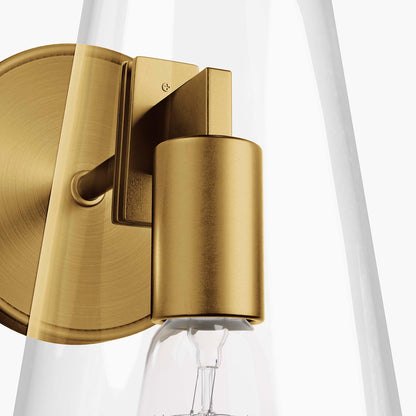 Wall sconce in clear satin brass finish with glass shade, 1-light.