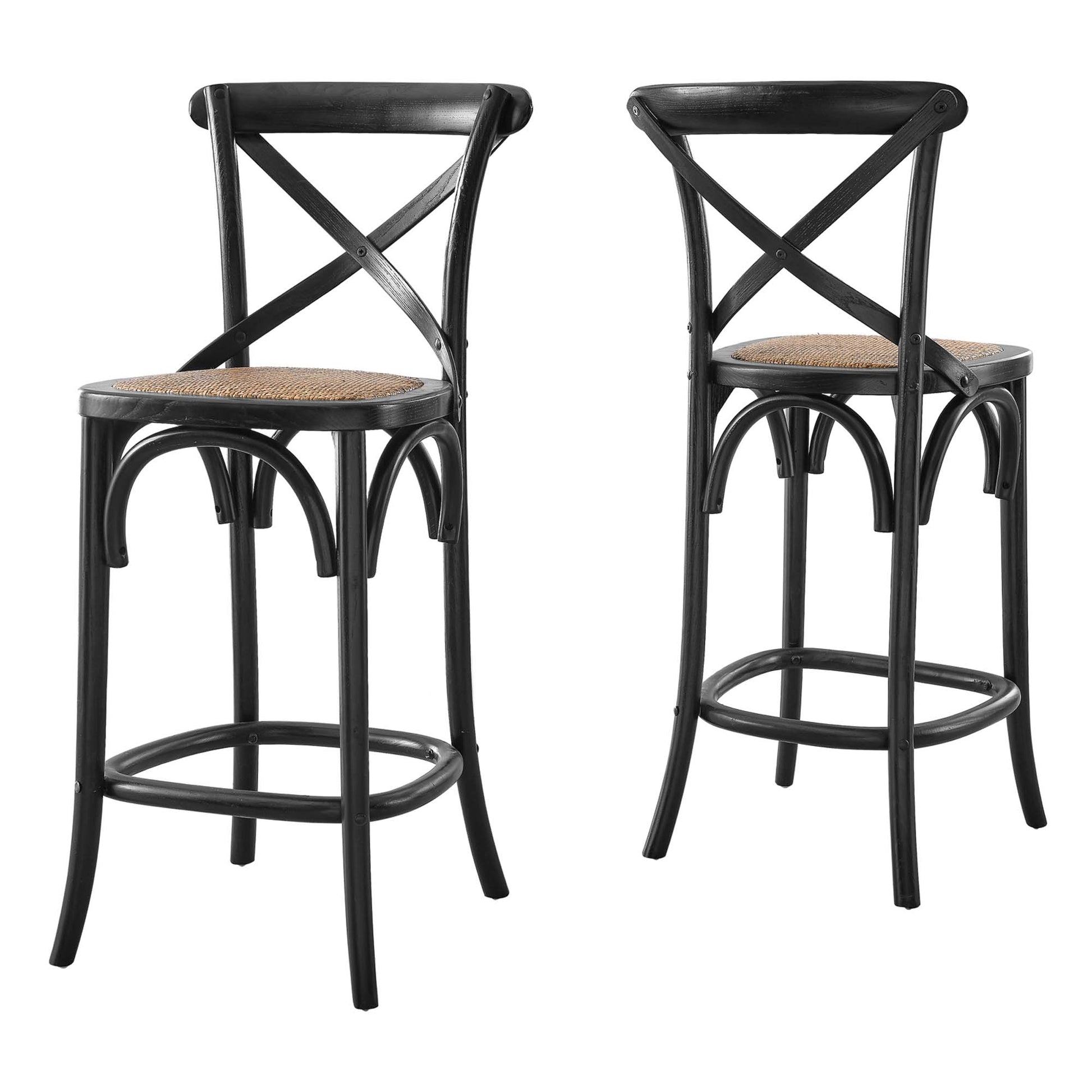 Pair of black counter stools with X-back, curved legs, circular footrests and woven rattan seats.