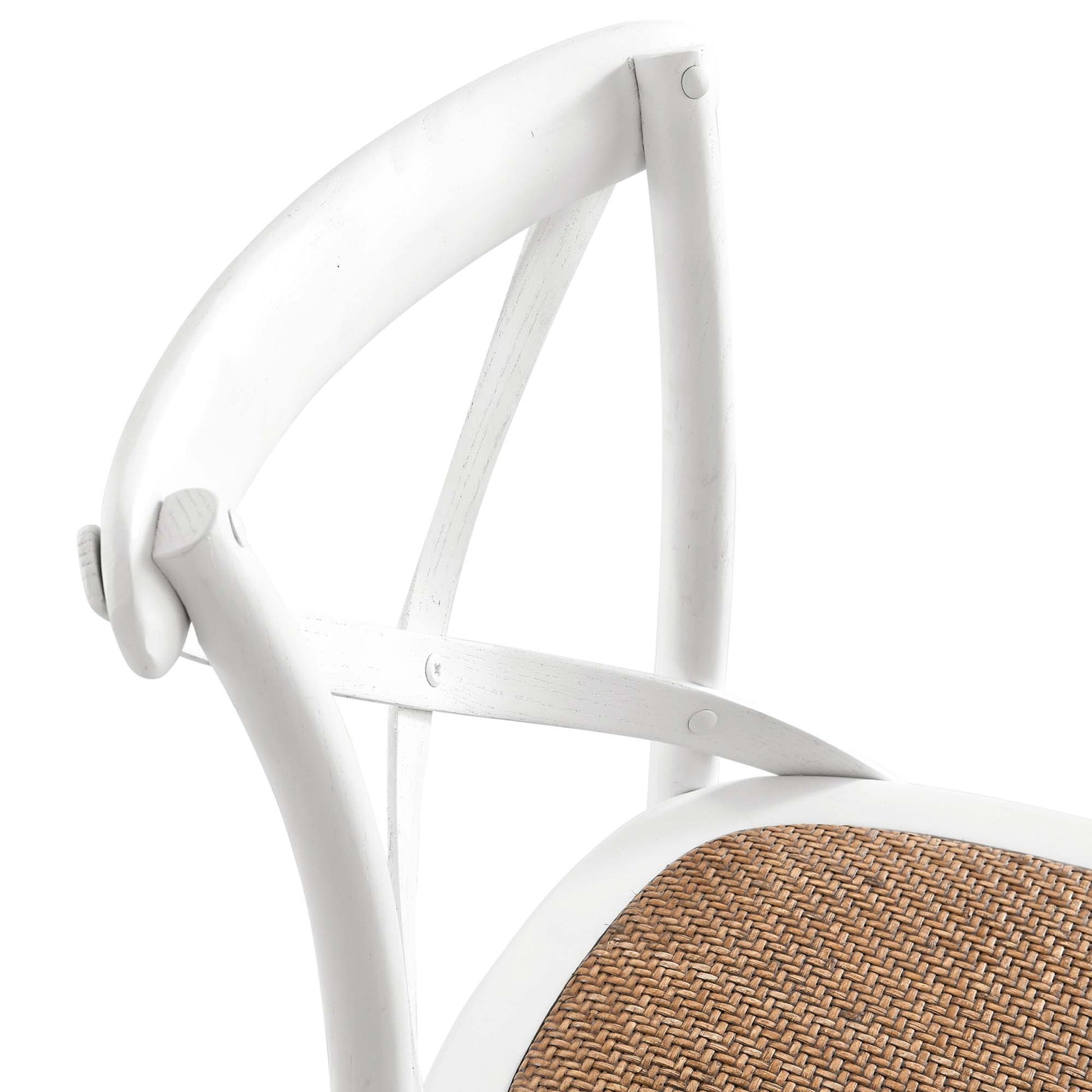White bar stool with curved back and tan woven rattan seat.