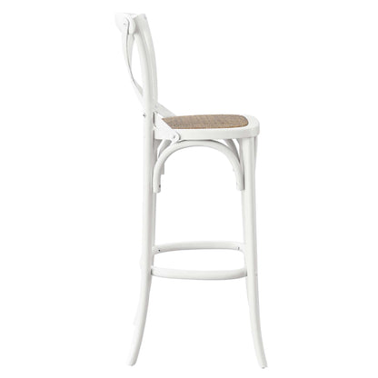 White metal bar stool with woven cane seat, curved back and footrest