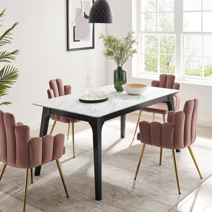 63" rectangular artificial marble dining table with black legs in a bright modern dining room