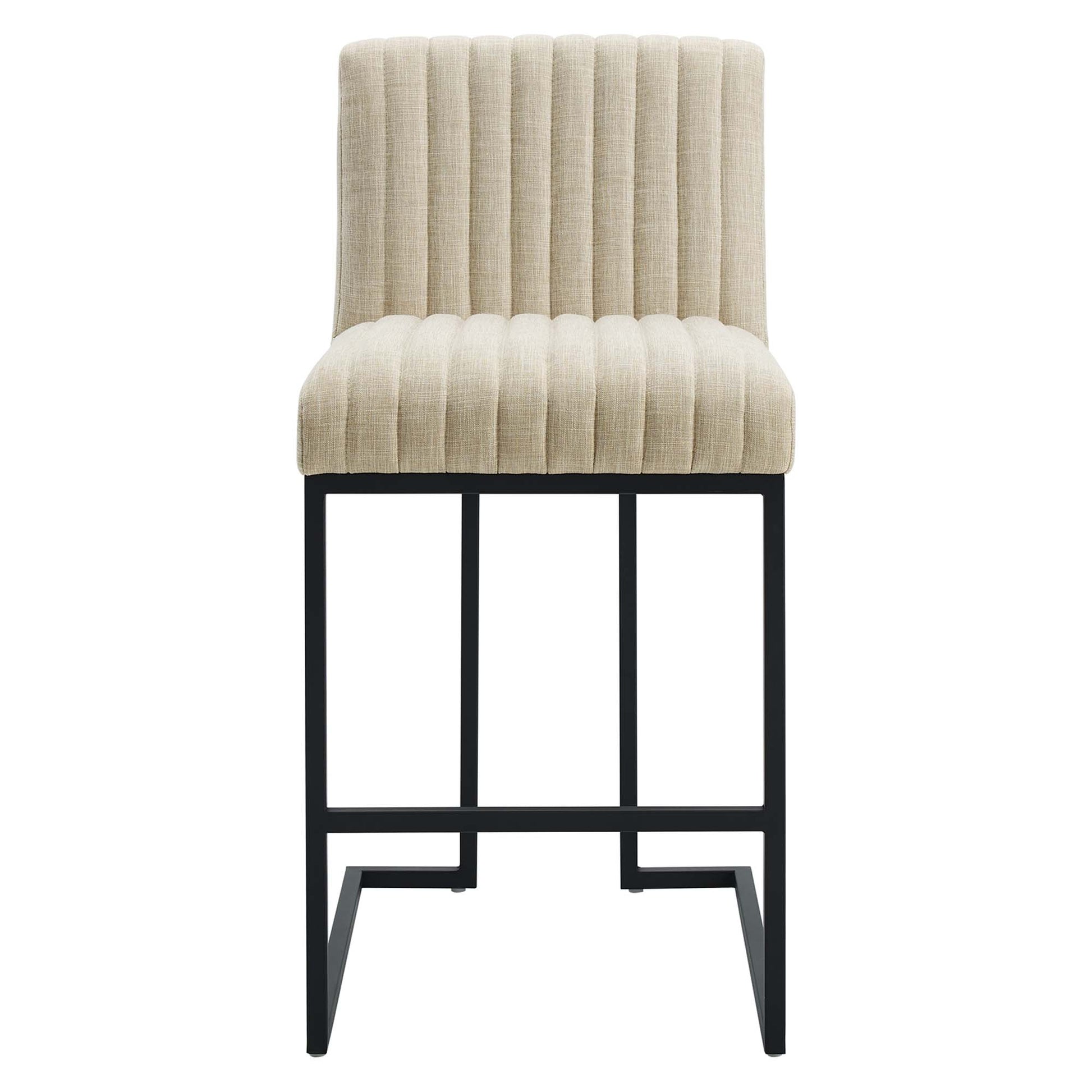 Brown upholstered counter stool with vertical channel tufting & black metal frame, rectangular footrest.