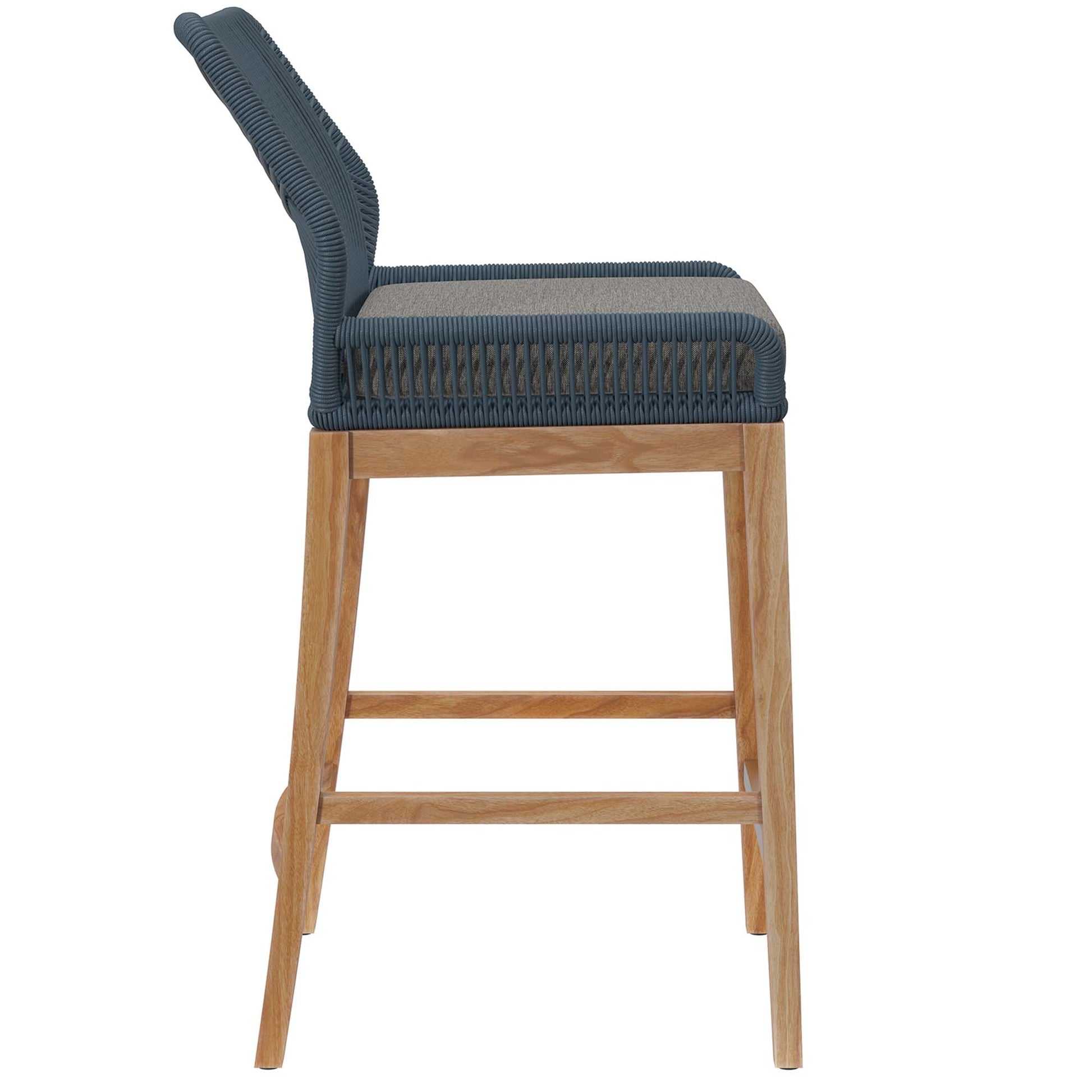 Teak wood outdoor patio bar stool with curved back, beige cushion, and footrest.
