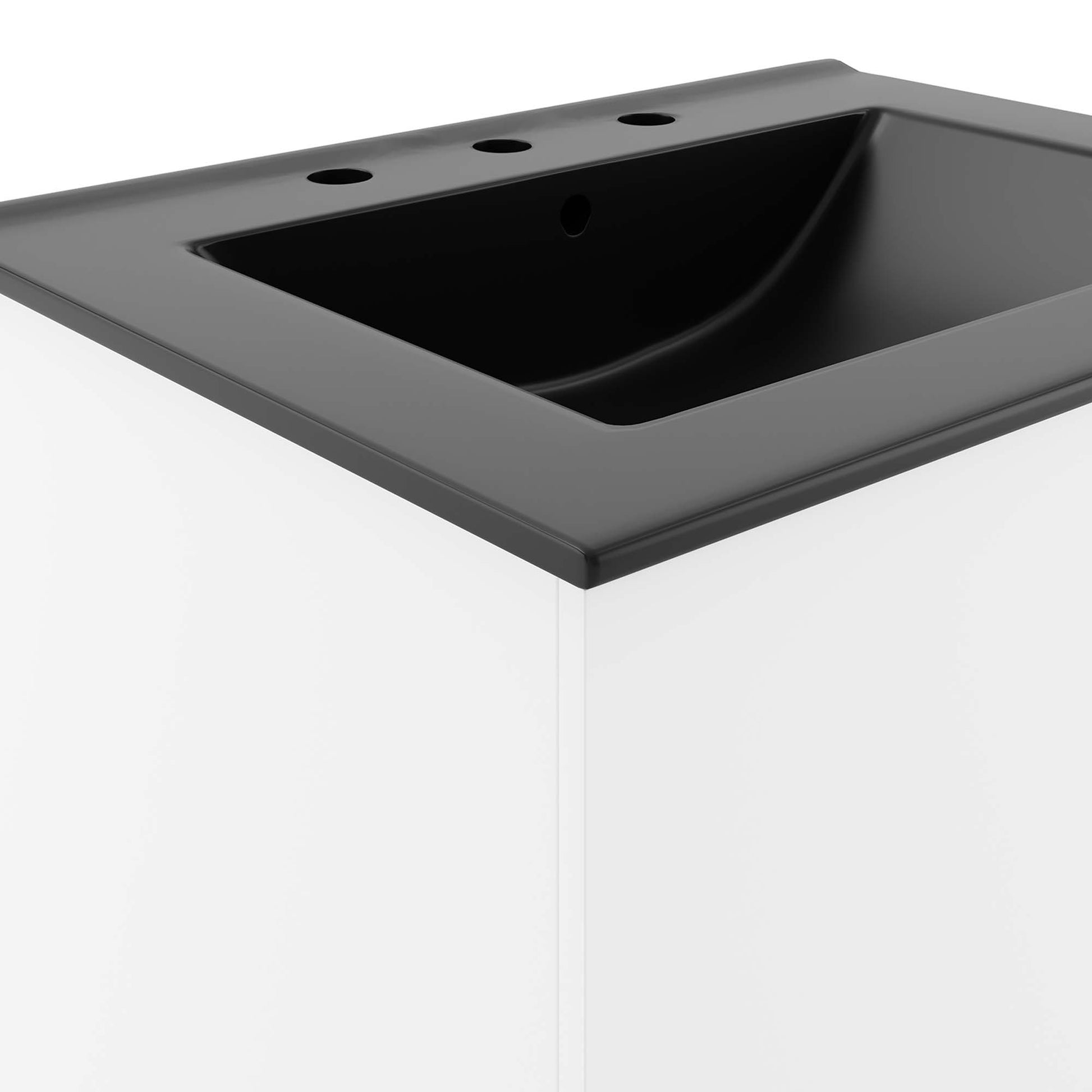Black bathroom vanity with gray countertop and black rectangular sink; three faucet holes at back, modern minimalist style.