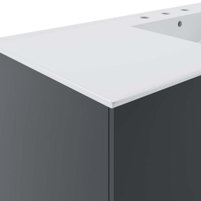 White countertop with predrilled faucet holes atop a white modern bathroom vanity with flat-panel doors.