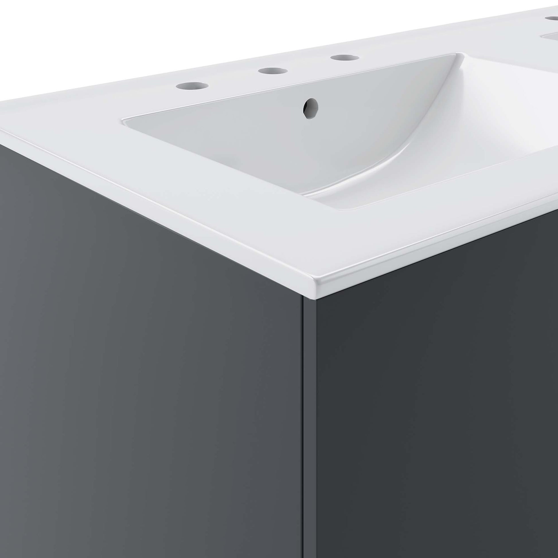 White solid-surface bathroom vanity with integrated rectangular sink, three faucet holes, and a dark gray cabinet.