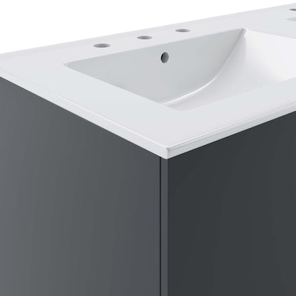White solid-surface bathroom vanity with integrated rectangular sink, three faucet holes, and a dark gray cabinet.