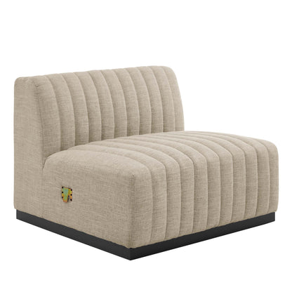 Beige fabric channel-tufted sofa with a black platform base.