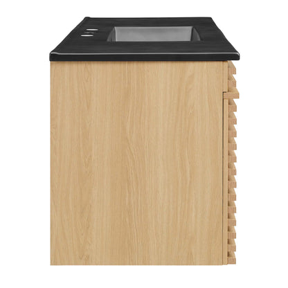 Oak wood cabinet with black top, built-in square metal trash bin, and decorative side slats.