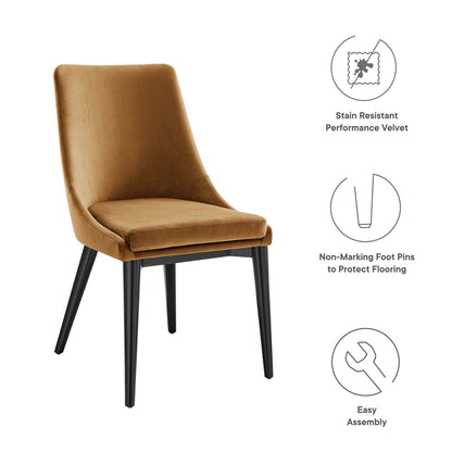 Brown stain-resistant velvet dining chairs with curved backs, padded seats, and black tapered legs; set of 2.