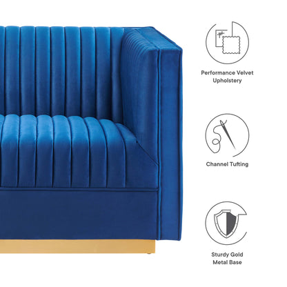 Navy velvet modular sectional sofa with square arms, vertical channel tufting, and a sturdy gold metal base.