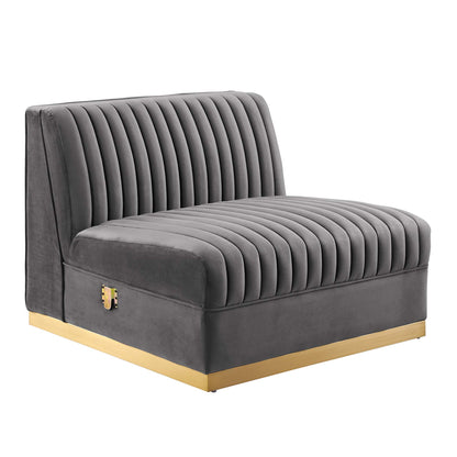 Gray velvet tufted modular sectional sofa with vertical channels, low back, light wood base.