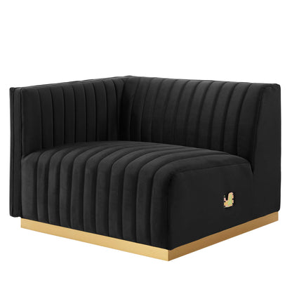 Black channel-tufted velvet loveseat with gold base trim.