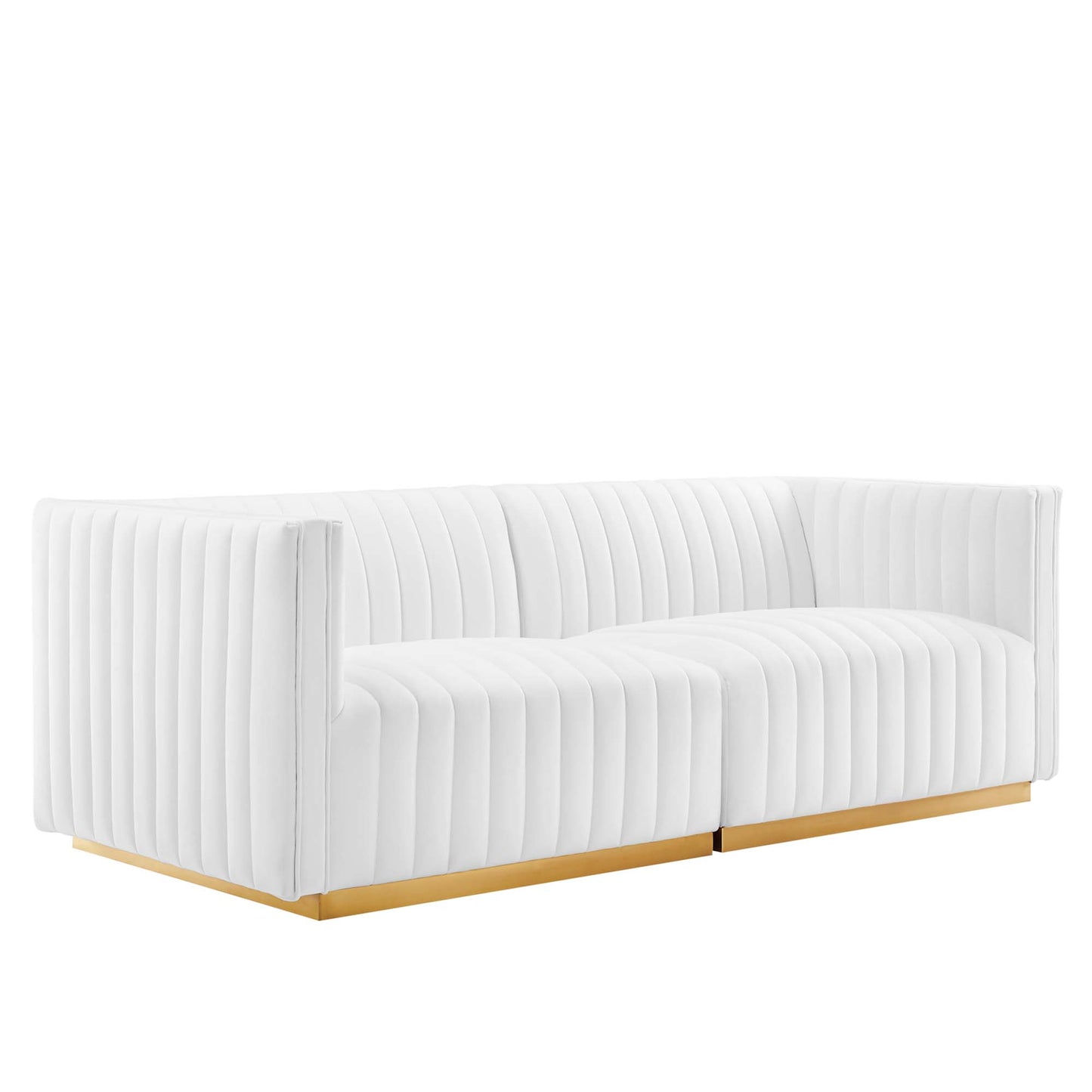 Low-profile white velvet channel-tufted loveseat with rectangular arms and gold metal base.