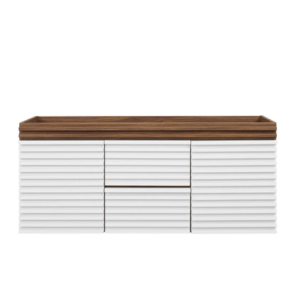 White ribbed bathroom vanity cabinet with walnut top, low-profile design featuring center drawers and outer storage doors.