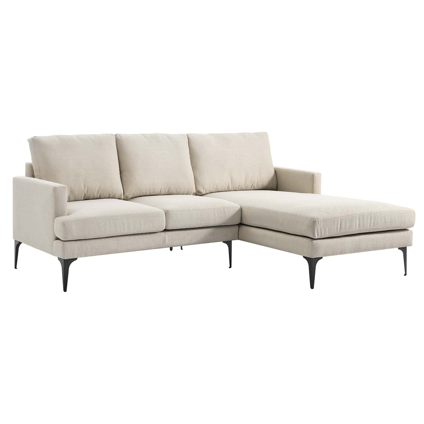 Beige fabric L-shaped sectional with chaise, three back cushions, and slim black tapered legs.