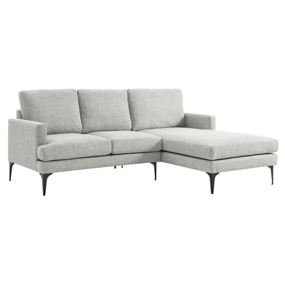 Light gray L-shaped sectional sofa with chaise on right, slim black metal legs, cushioned back and seat.