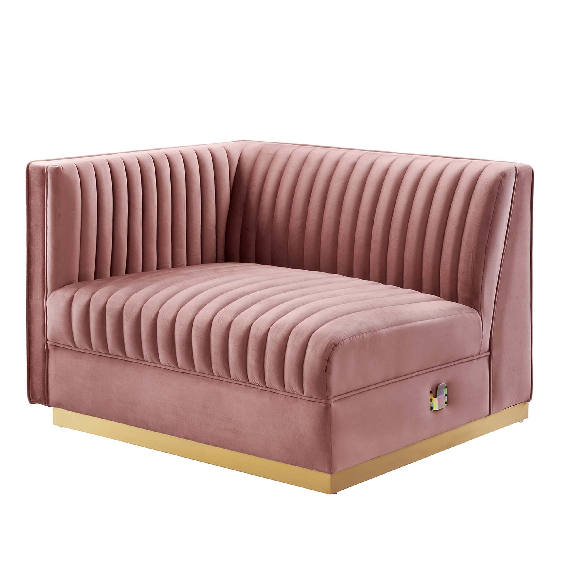 Dusty rose velvet modular sectional sofa with vertical channel tufting and a gold-tone metal base, including a left-arm chair.