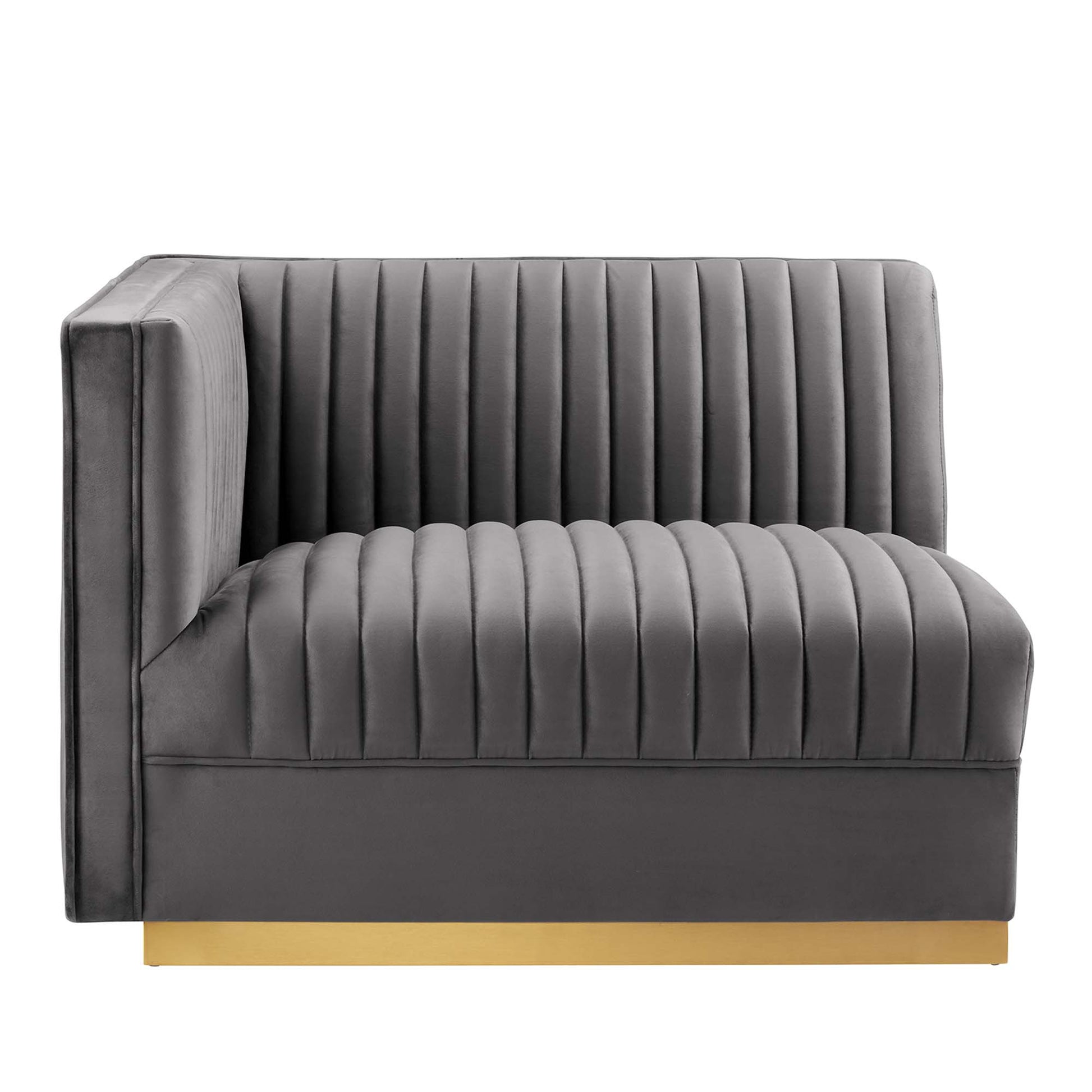 Grey velvet channel-tufted left-arm chair with square arm and gold base.