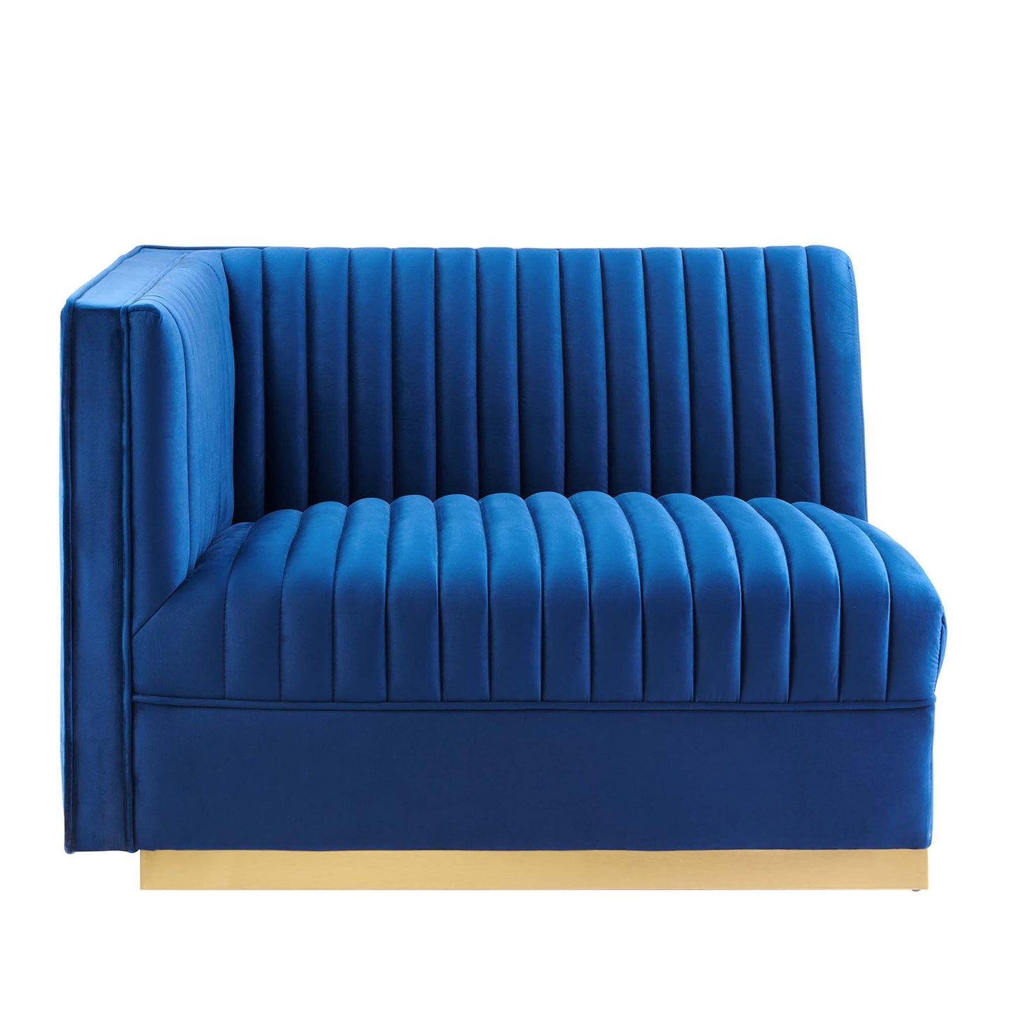 Navy blue velvet modular sectional sofa with left-arm chair, vertical channel tufting & slim gold plinth base.