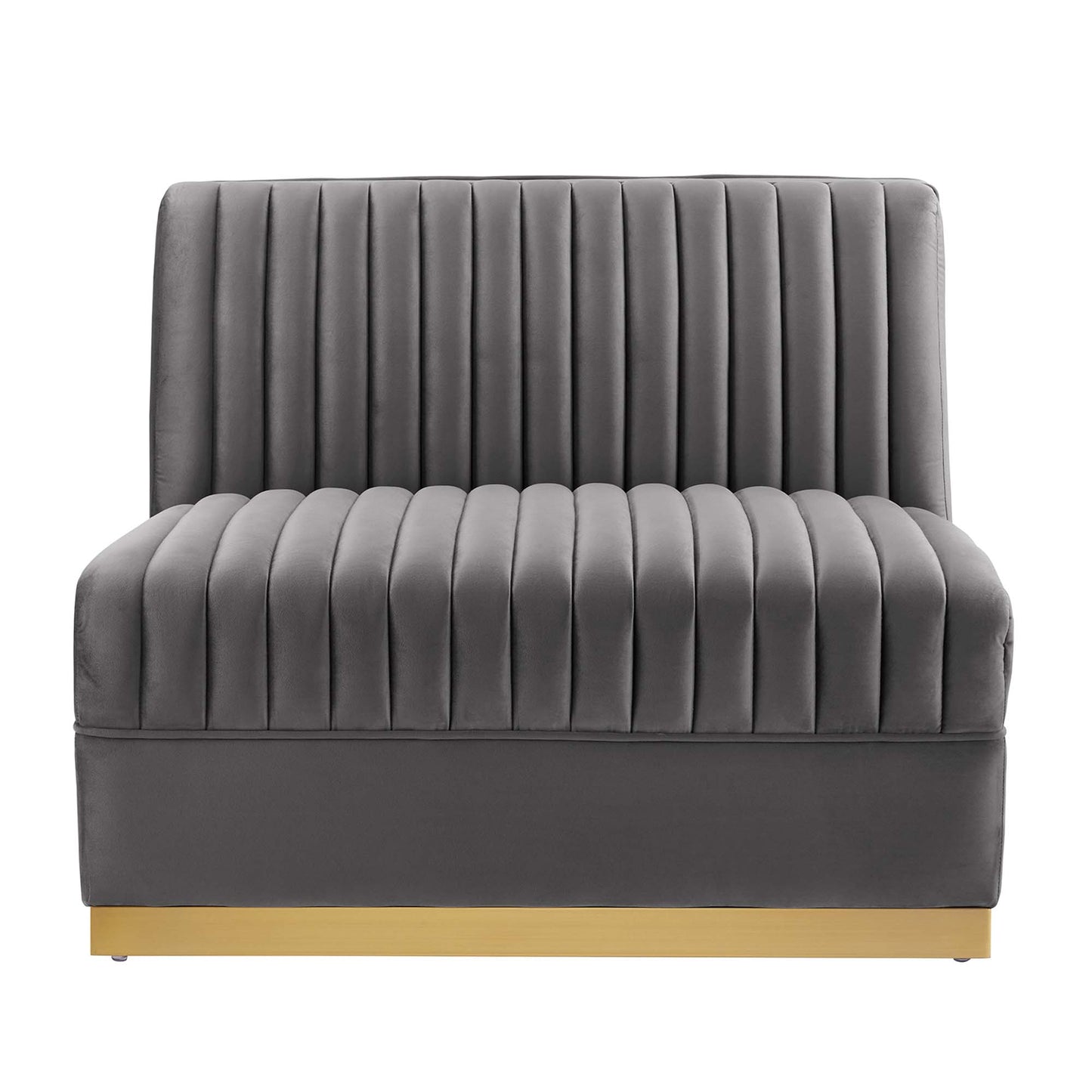 Gray velvet armless chair with vertical channel tufting on back and seat, on a light wood platform base.