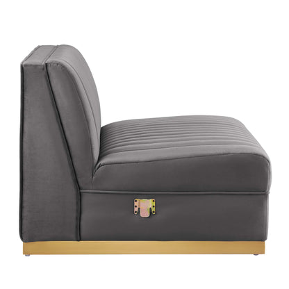 Gray armless chair with vertical channel tufting.