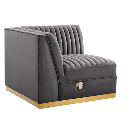 Gray velvet left corner chair for modular sectional, channel-tufted with vertical channels and a gold metal plinth base.