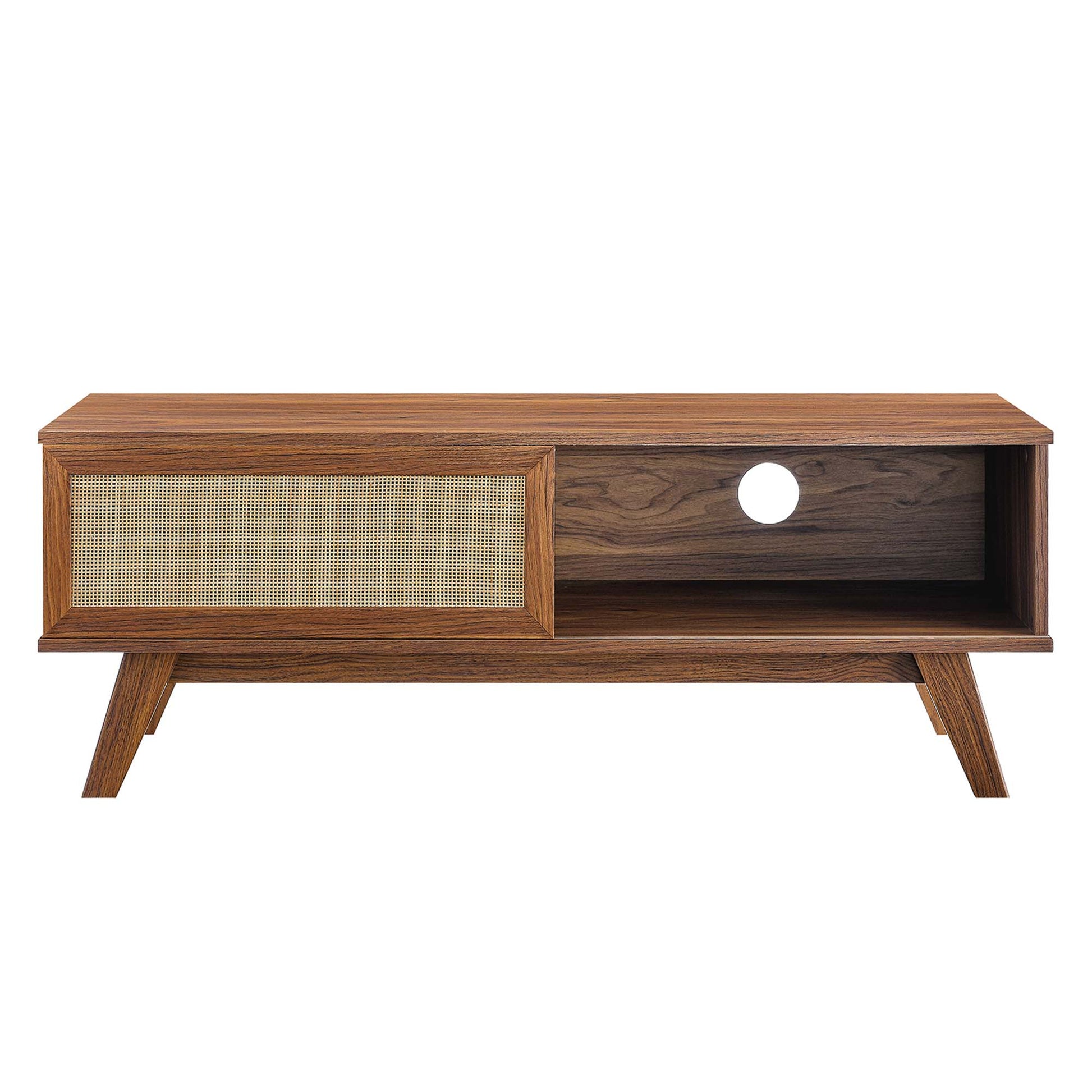 Walnut mid-century TV stand with a woven rattan door on left and an open right compartment with a cable hole, angled legs.