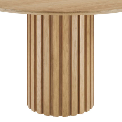 Natural oak round dining table with a fluted pedestal of vertical wooden slats.