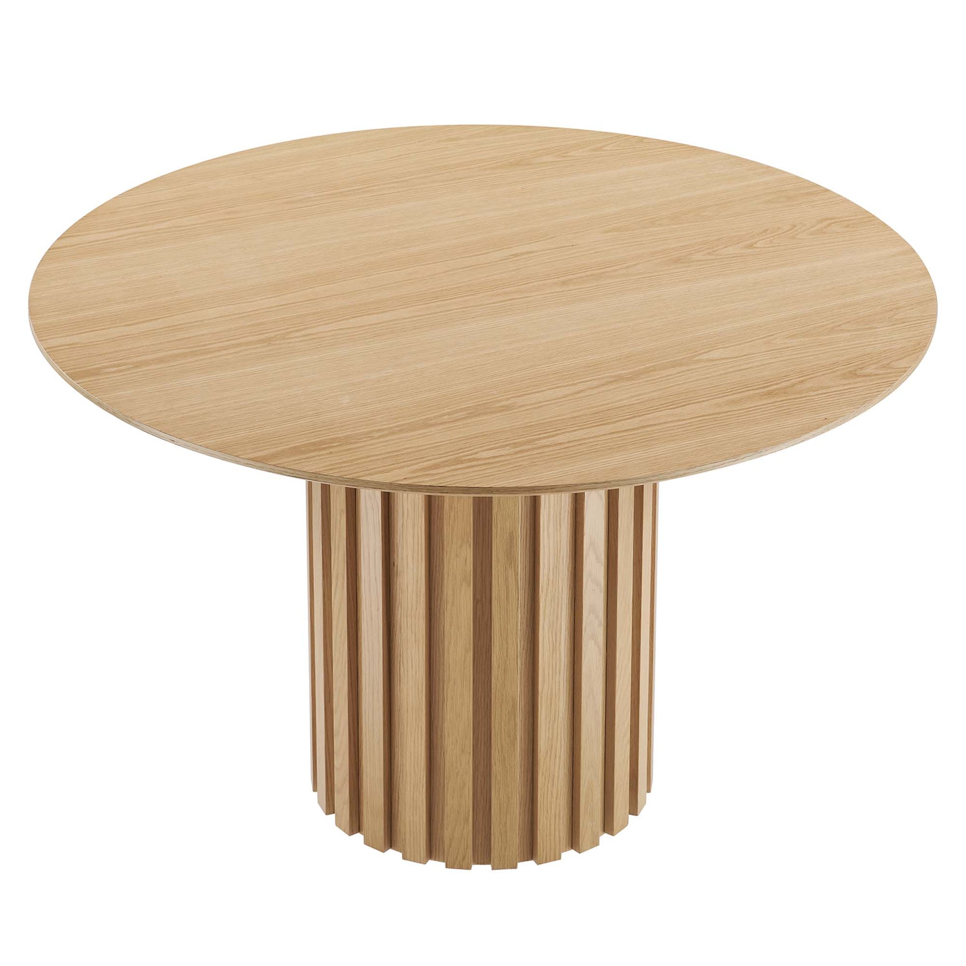 Round oak dining table with natural finish and a vertical slat drum pedestal.