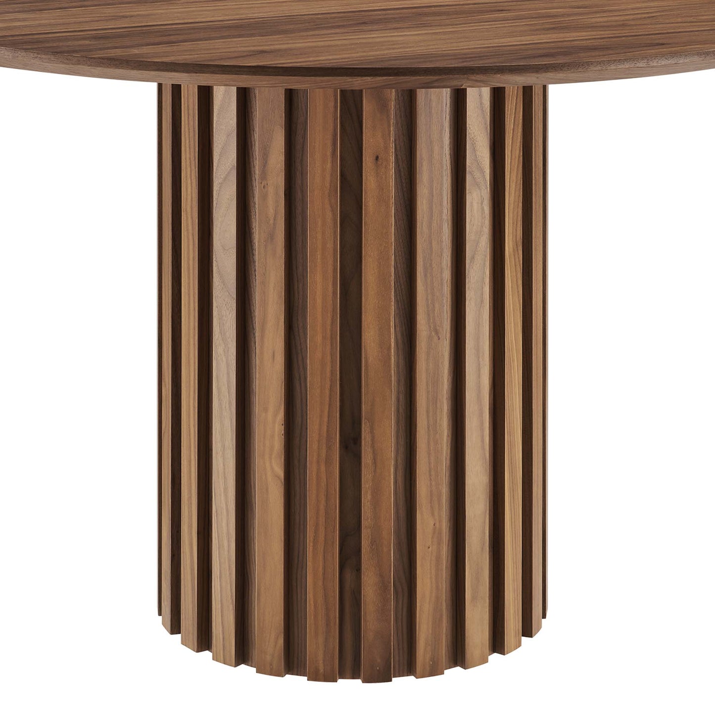 Walnut round dining table with a slatted cylindrical pedestal formed by vertical wooden slats.