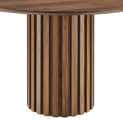 Walnut round dining table with a slatted cylindrical pedestal formed by vertical wooden slats.