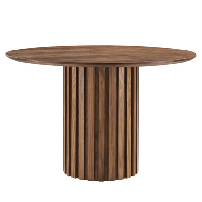 Round walnut wood dining table with a slatted cylindrical pedestal base, modern rustic style.