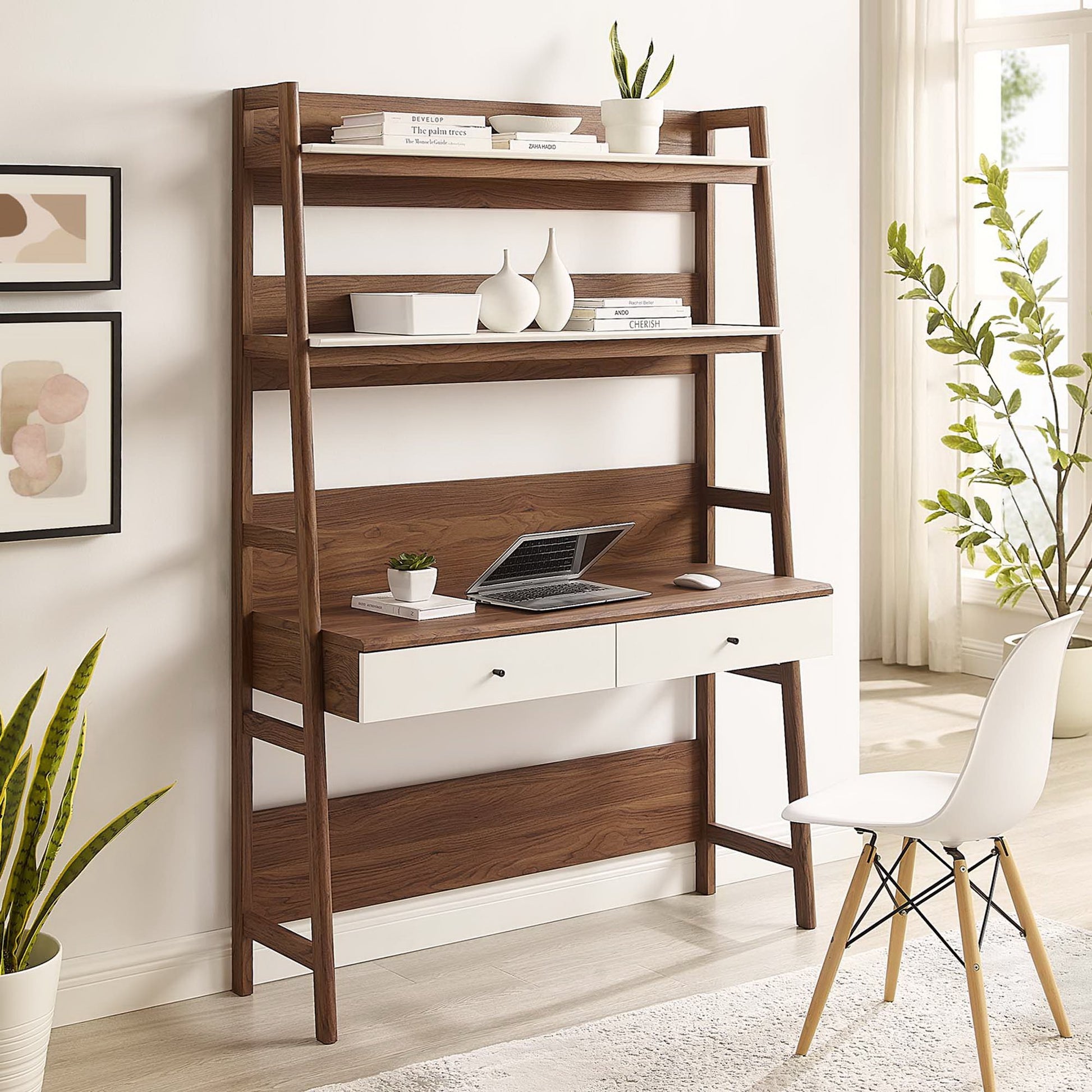 White ladder desk with two drawers and open shelves, laptop on the desk, suitable for a home office.