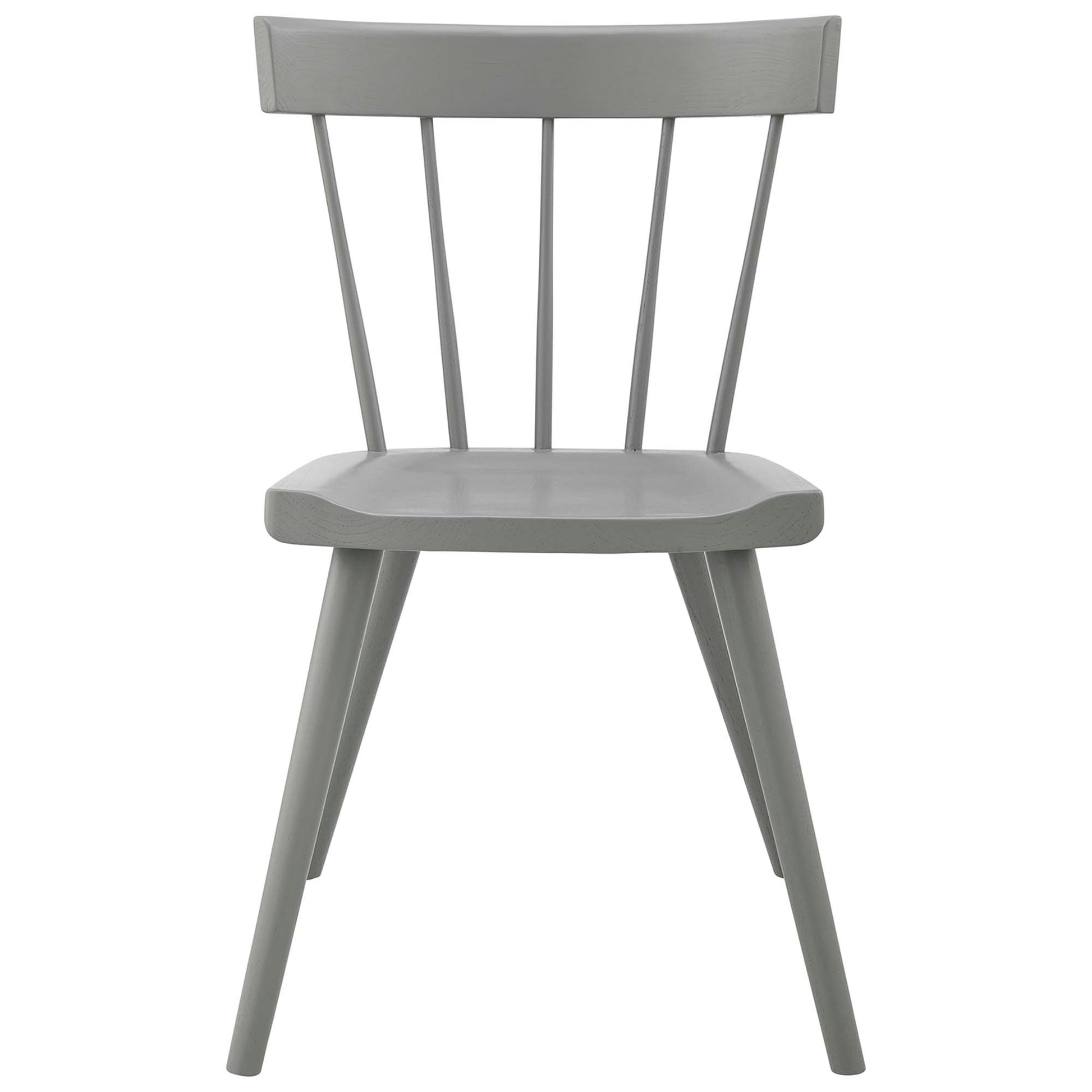 Gray-painted wooden dining chairs with spindle backs, curved seats and tapered legs.