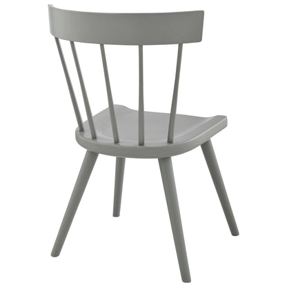 Gray-painted wooden Windsor chair with curved back, spindle supports, rounded seat, and angled legs.