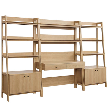 Light oak three-piece wood office desk and bookshelves: central desk with two drawers between tall side bookshelves.