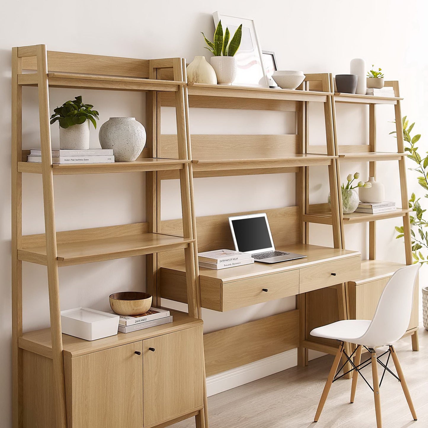 Brown wood 3-piece office desk and bookshelf set with full-length shelving, central drawers and laptop workspace; Scandinavian home office storage.