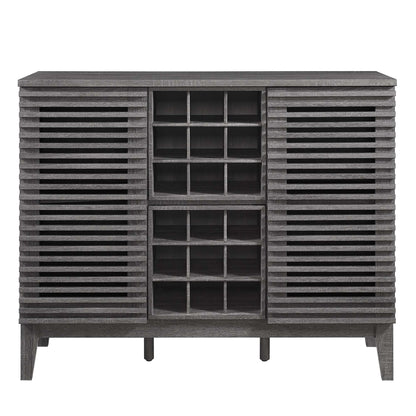 Brown bar cabinet with slatted side panels, a central grid wine storage, and raised legs.